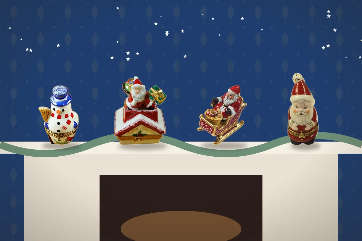 Christmas Limoges boxes on a fireplace mantel: snowmen, Santa on a rooftop, Santa in a sleigh and a Santa figure.